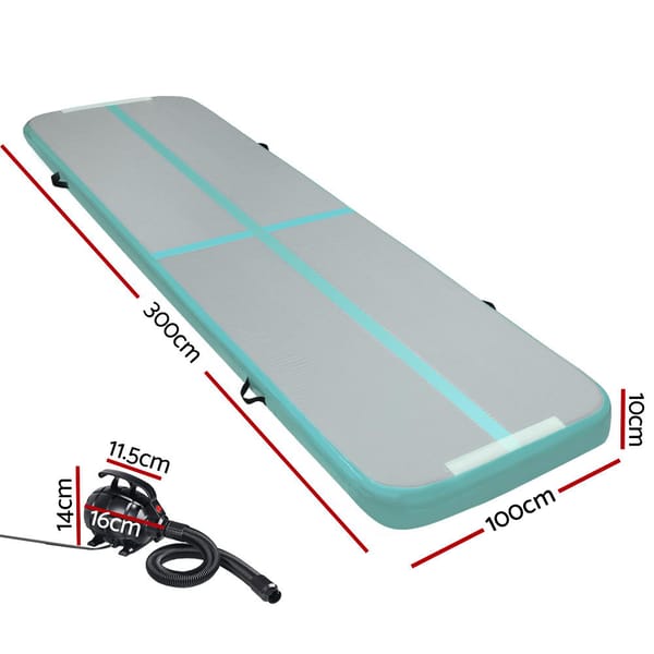 Inflatable air track with pump and measurements on a white background