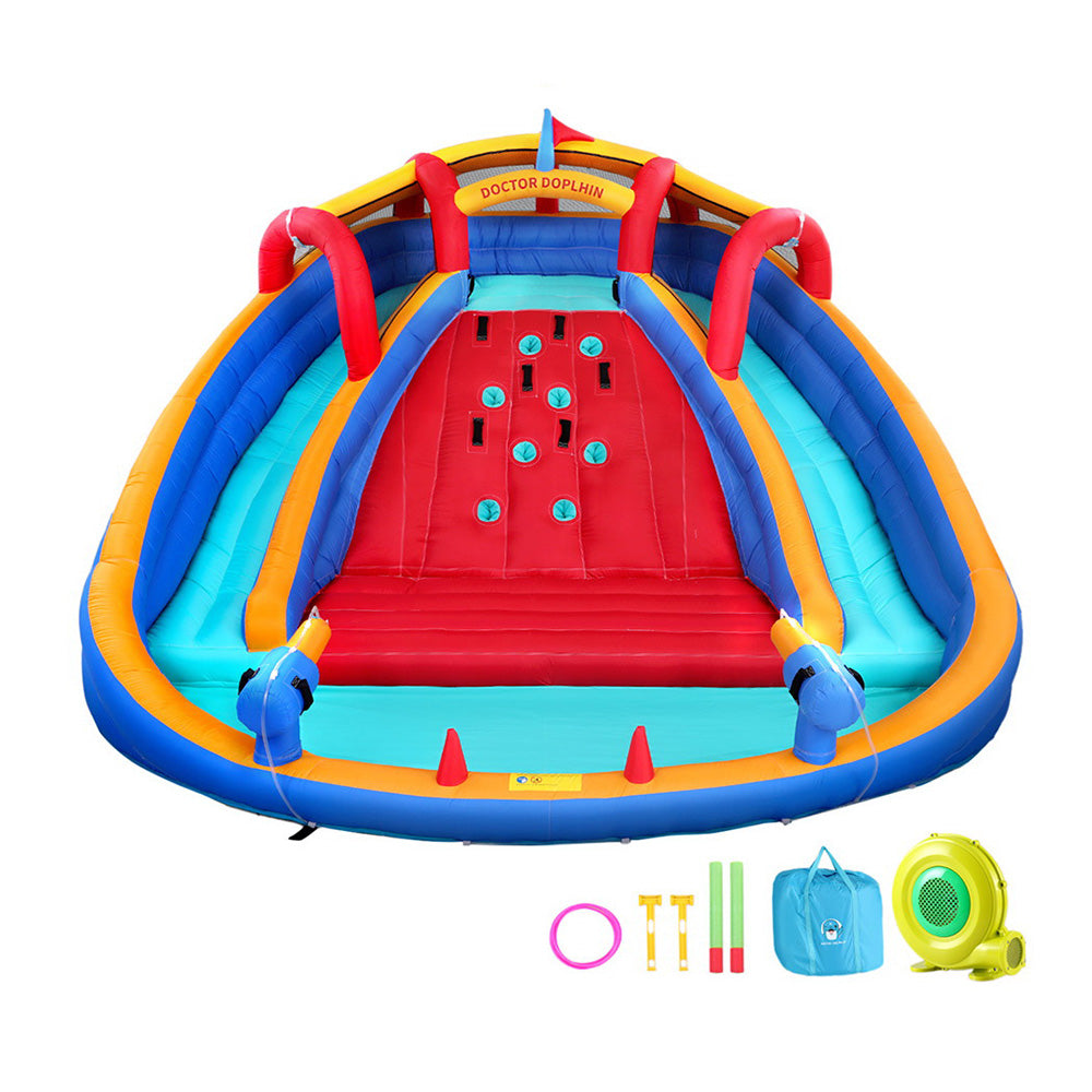 Colourful inflatable playground with slide and accessories on a white background
