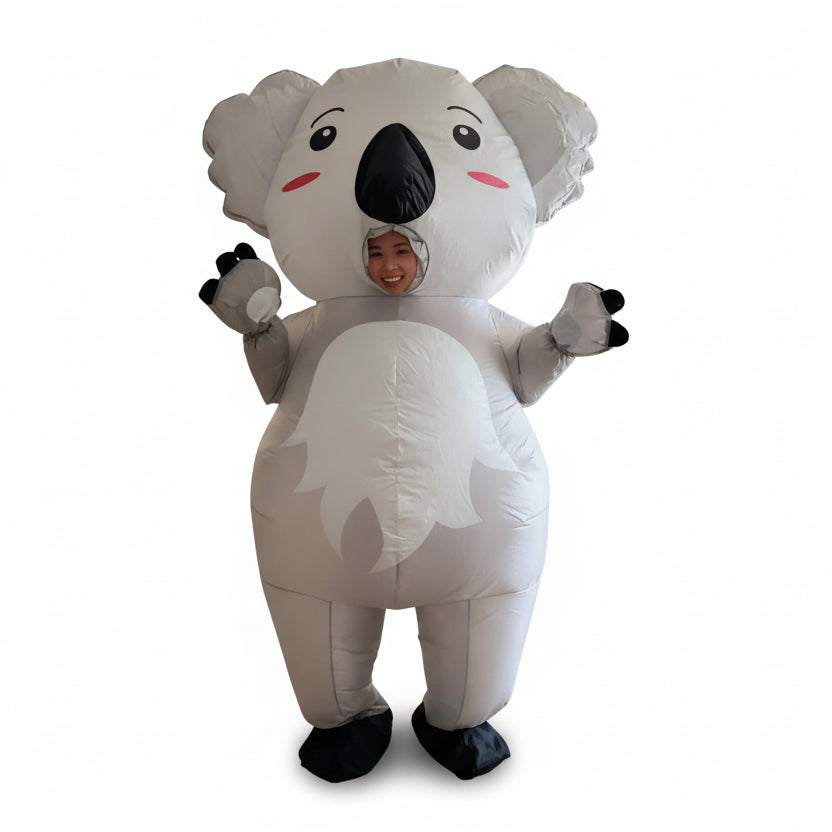 Person wearing an inflatable koala costume in white background.