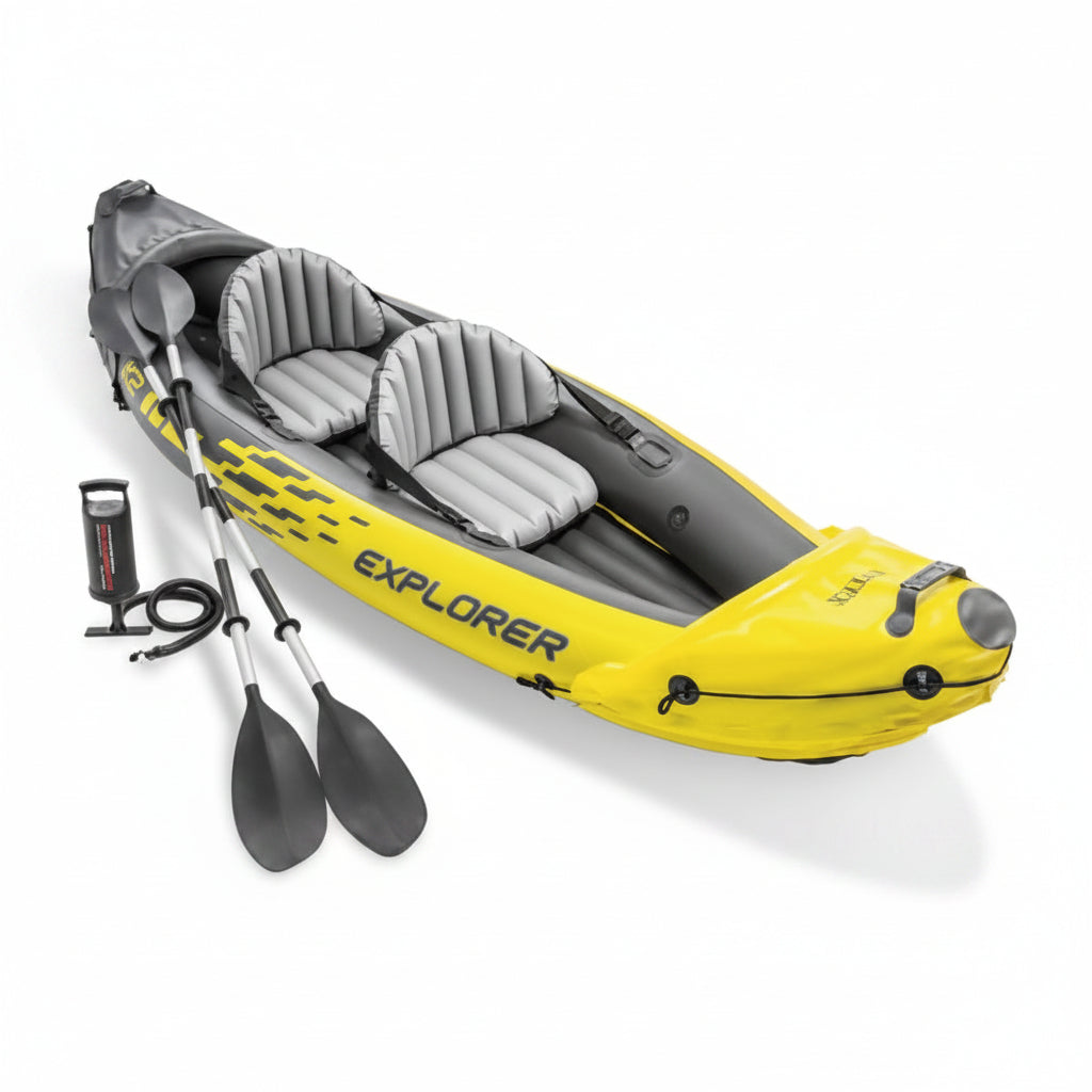 Yellow and gray inflatable kayak with paddles on a white background