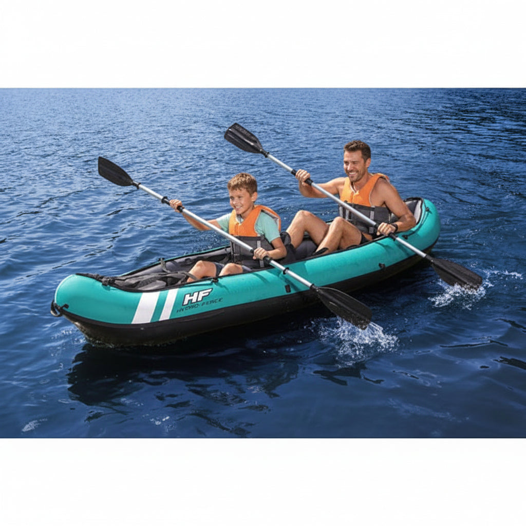 Two people paddling a teal inflatable kayak on calm water.