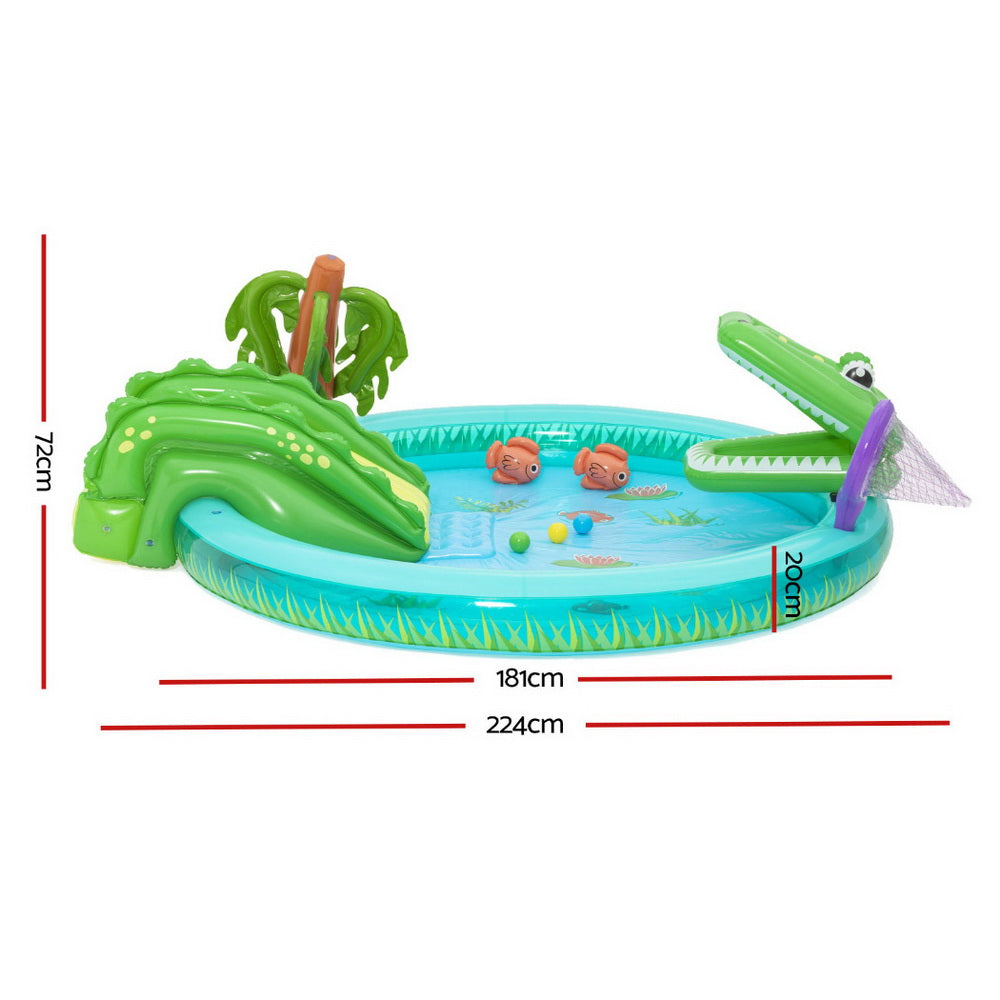 Inflatable pool with crocodile design and measurements on a white background